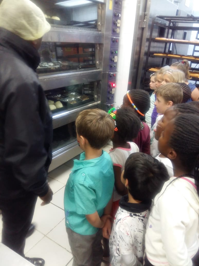 Grade Rs anxiously waiting for their gingerbread men to be baked