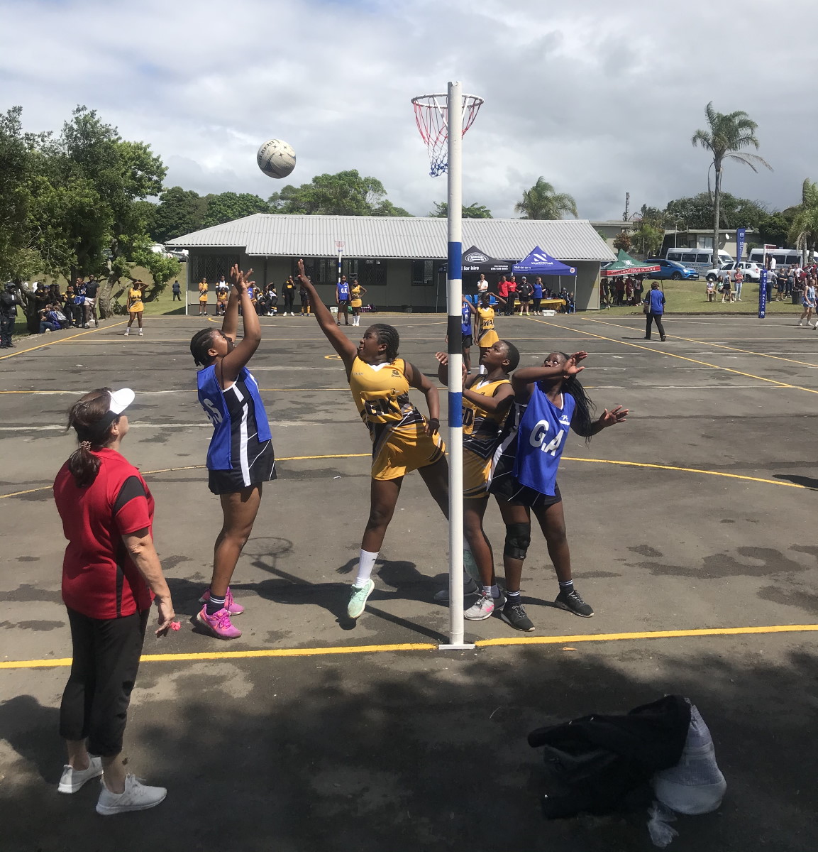 Sinyolo Kibi shooting a goal for KEHS 1st Netball Team
